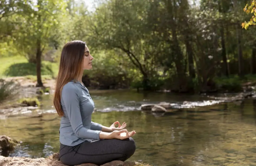 Woman meditating in nature