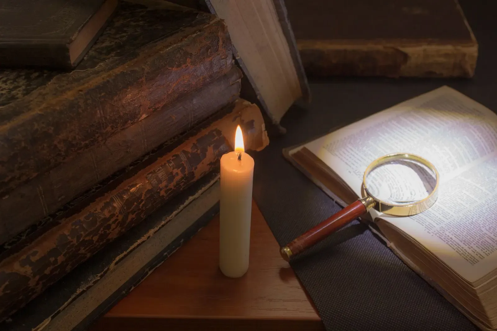 Old books by candlelight